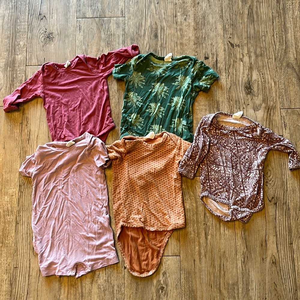 Kate Quinn Onesie Collection